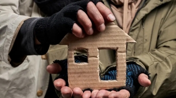 A small cardboard cut-out of a house